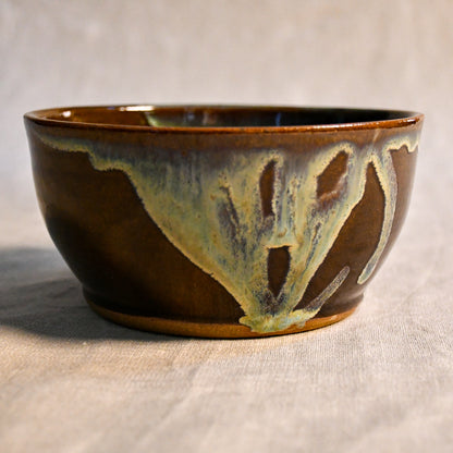 Handmade ceramic chili bowl by Leigh Art featuring Espuela glaze with one-of-a-kind earth-tone movement and wheel-thrown craftsmanship.