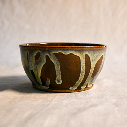 Handmade ceramic chili bowl by Leigh Art featuring Espuela glaze with one-of-a-kind earth-tone movement and wheel-thrown craftsmanship.