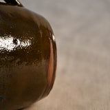 Handmade ceramic mug by Leigh Art featuring Espuela glaze with one-of-a-kind earth-tone movement and wheel-thrown craftsmanship.