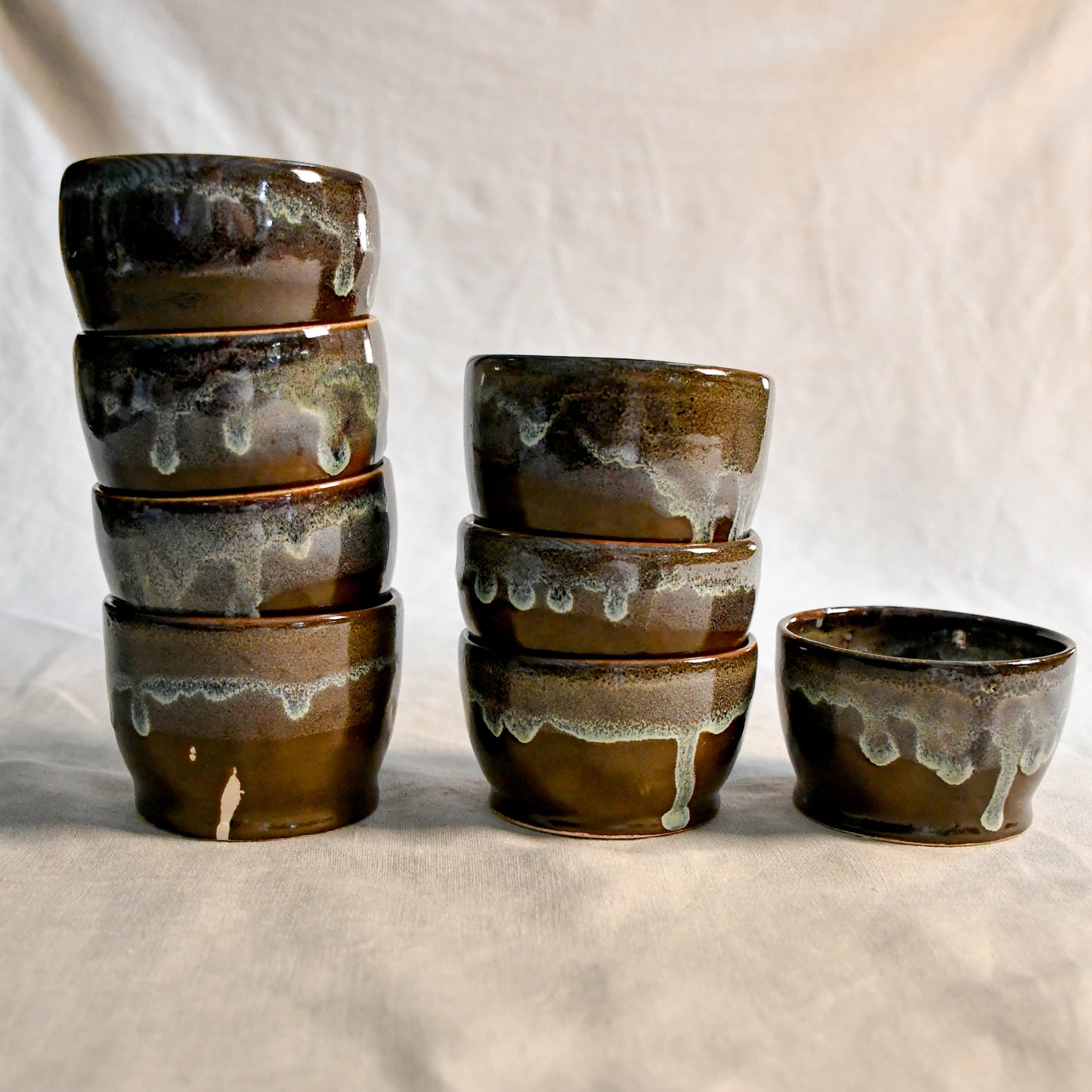 Handmade ceramic salsa bowl by Leigh Art featuring Espuela glaze with one-of-a-kind earth-tone movement and wheel-thrown craftsmanship.