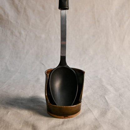 Handmade Espuela ceramic spoon rest by Leigh Art featuring layered earth-tone glaze with organic movement and one-of-a-kind variation.