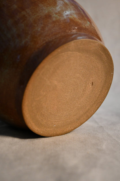 Bottom view of a handcrafted ceramic chili bowl with an unglazed foot and Heirloom Blue glazed exterior.