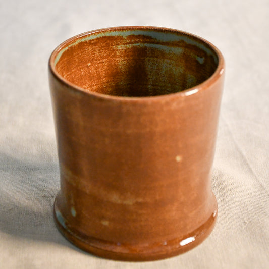 Handmade Heirloom Blue ceramic vessel by Leigh Art featuring chestnut brown and blue-green glaze variation, wheel-thrown stoneware accent piece from the Clayground collection.