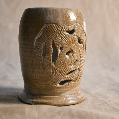 White handmade wheel thrown, hand carved Peony design lantern fit for a tea light. 