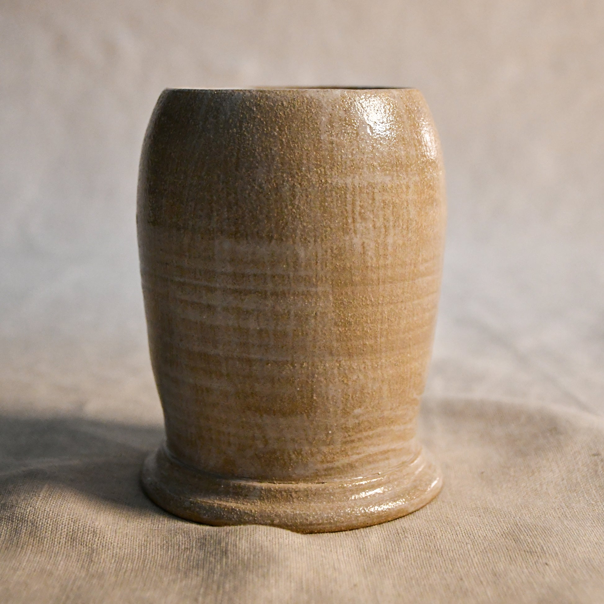 White handmade wheel thrown, hand carved Peony design lantern fit for a tea light. 