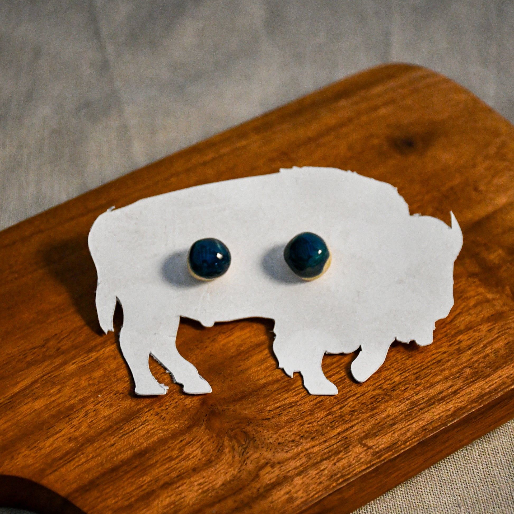 Handmade round ceramic stud earrings by Leigh Art.