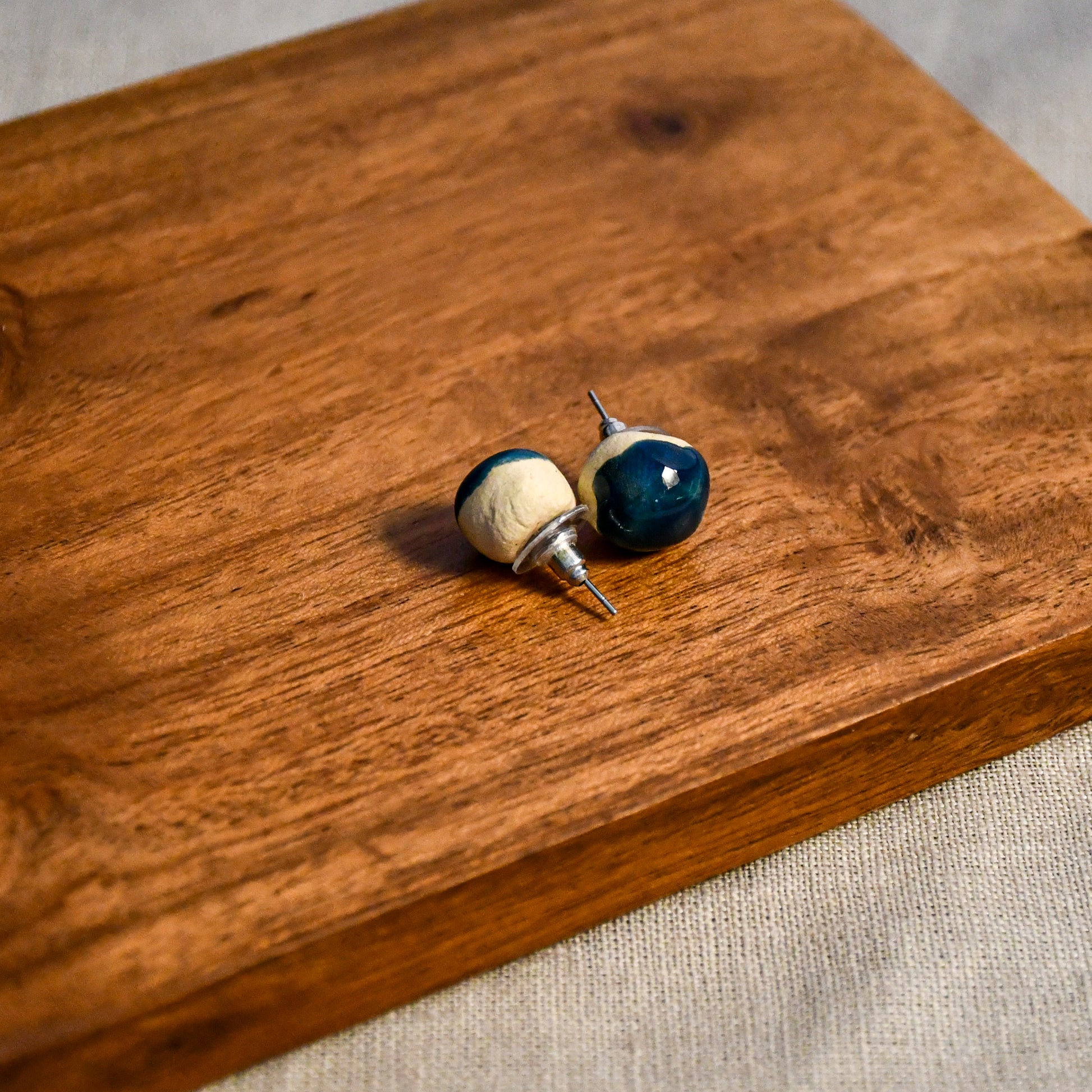 Handmade round ceramic stud earrings by Leigh Art.