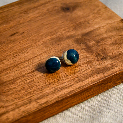 Handmade round ceramic stud earrings by Leigh Art.