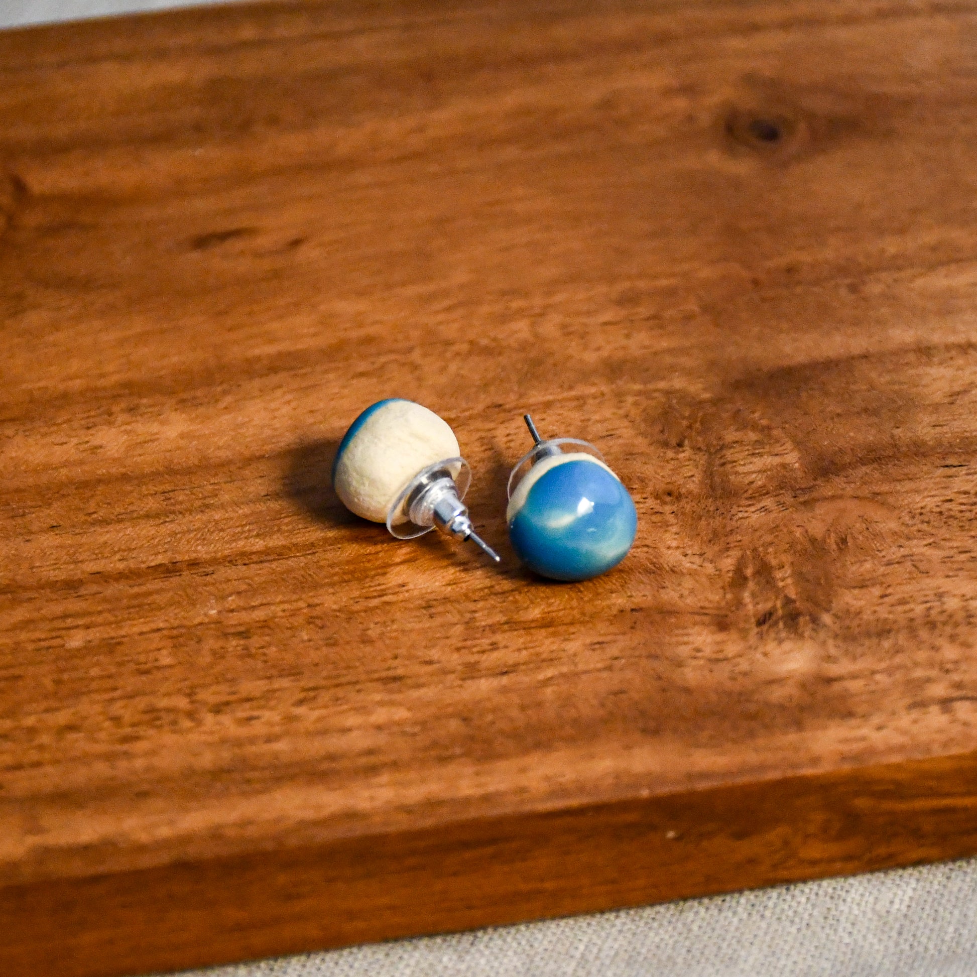 Handmade round ceramic stud earrings by Leigh Art.