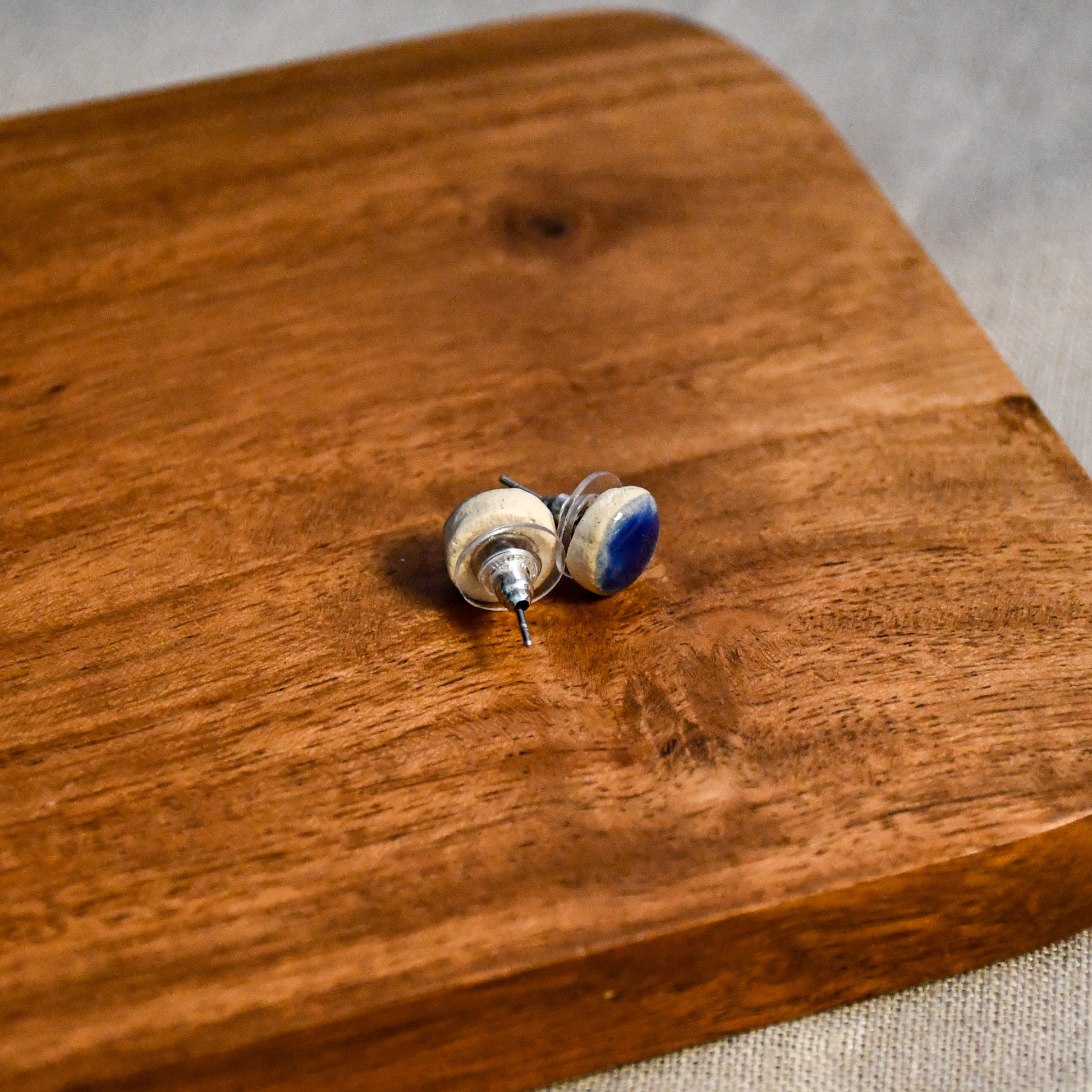 Handmade round ceramic stud earrings by Leigh Art.
