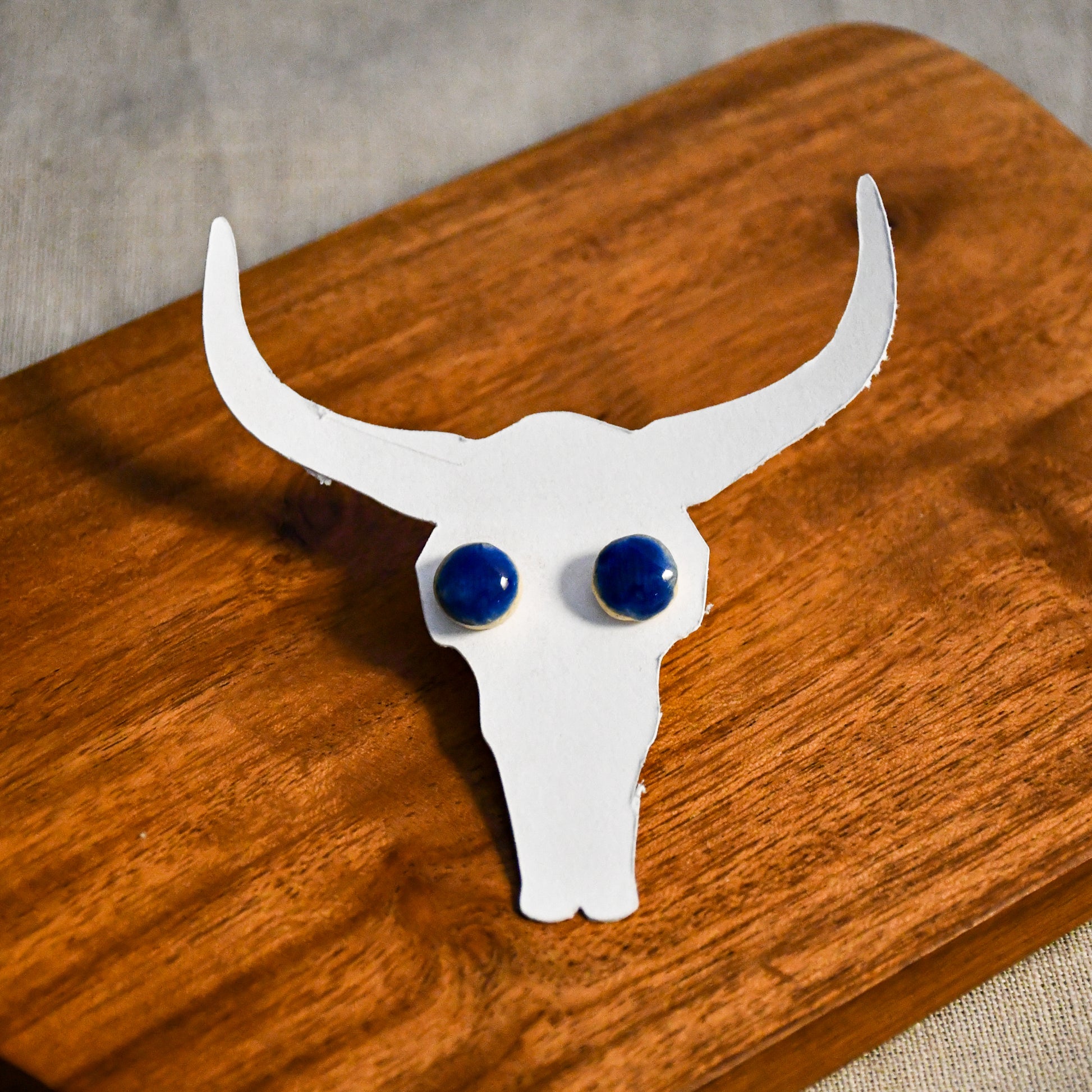 Handmade round ceramic stud earrings by Leigh Art.