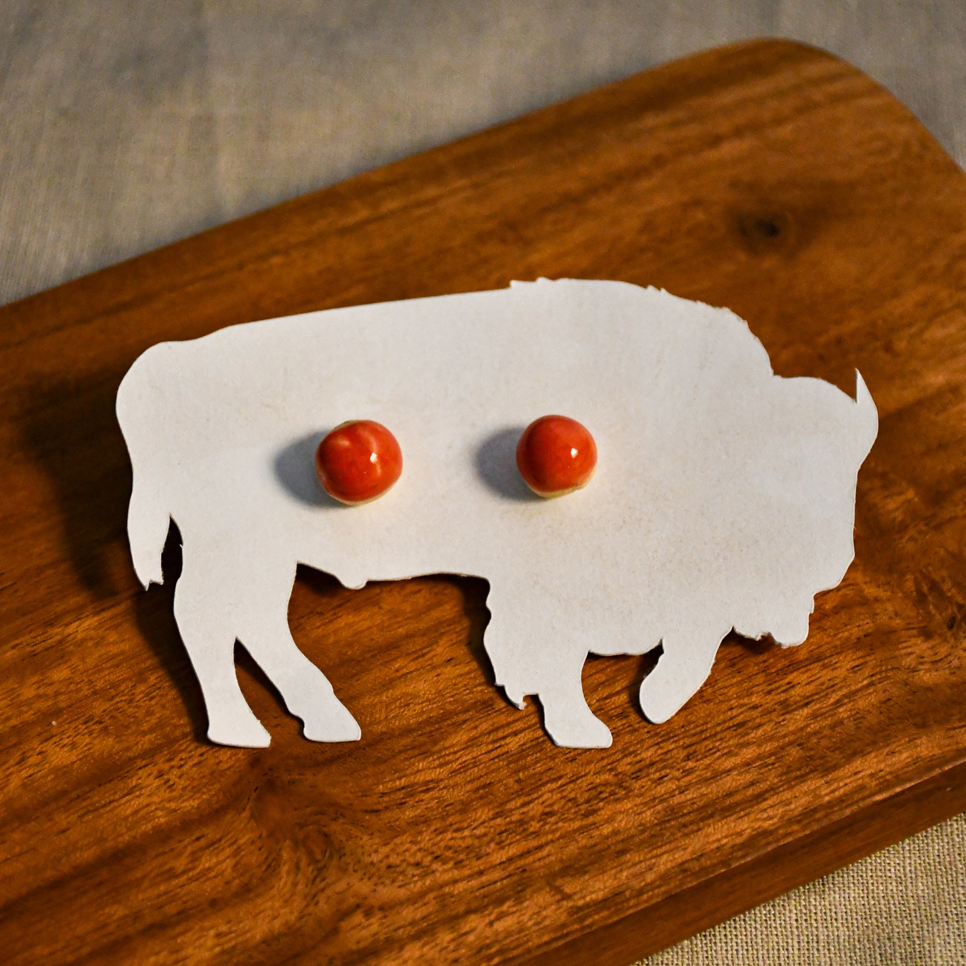 Handmade round ceramic stud earrings by Leigh Art.