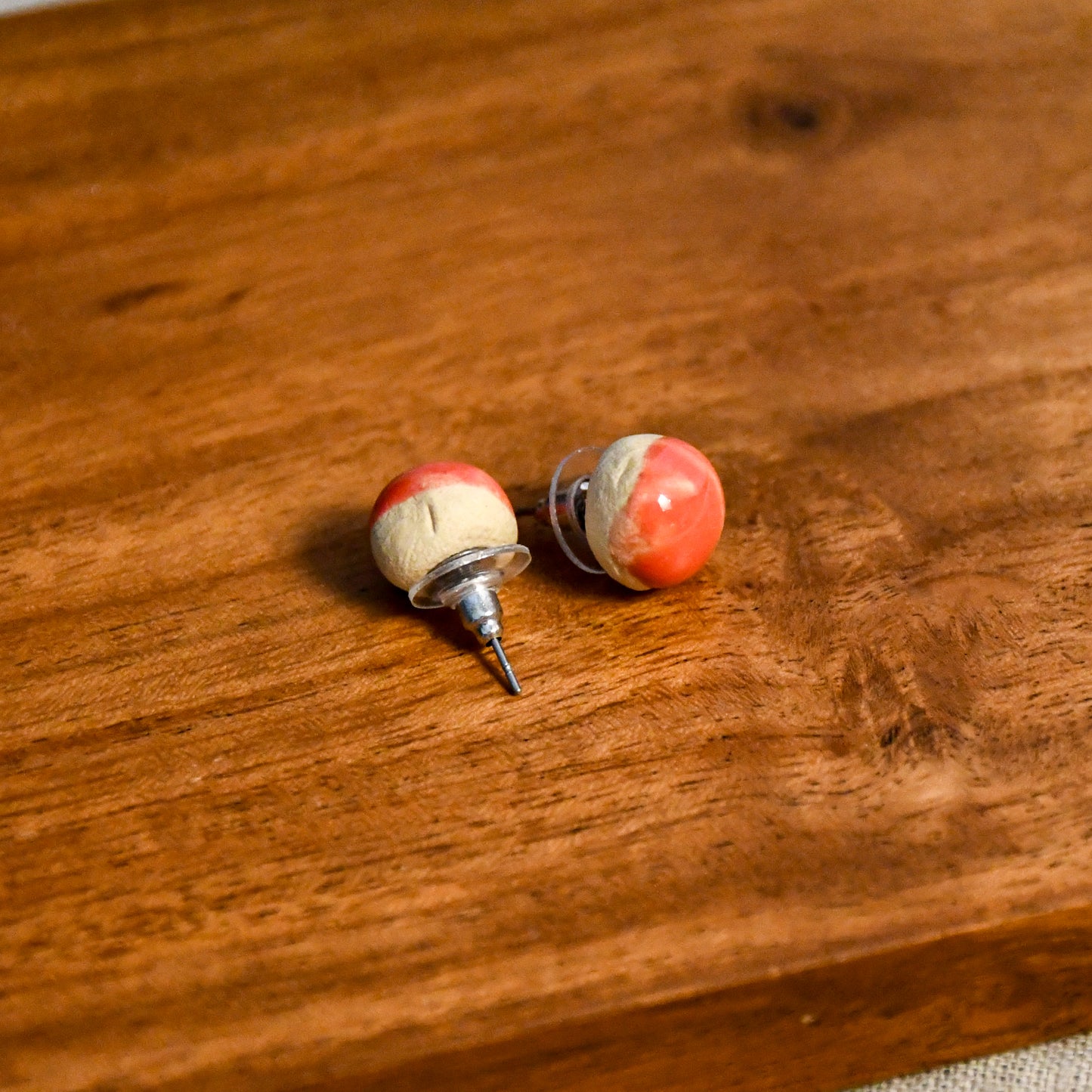 Handmade round ceramic stud earrings by Leigh Art.