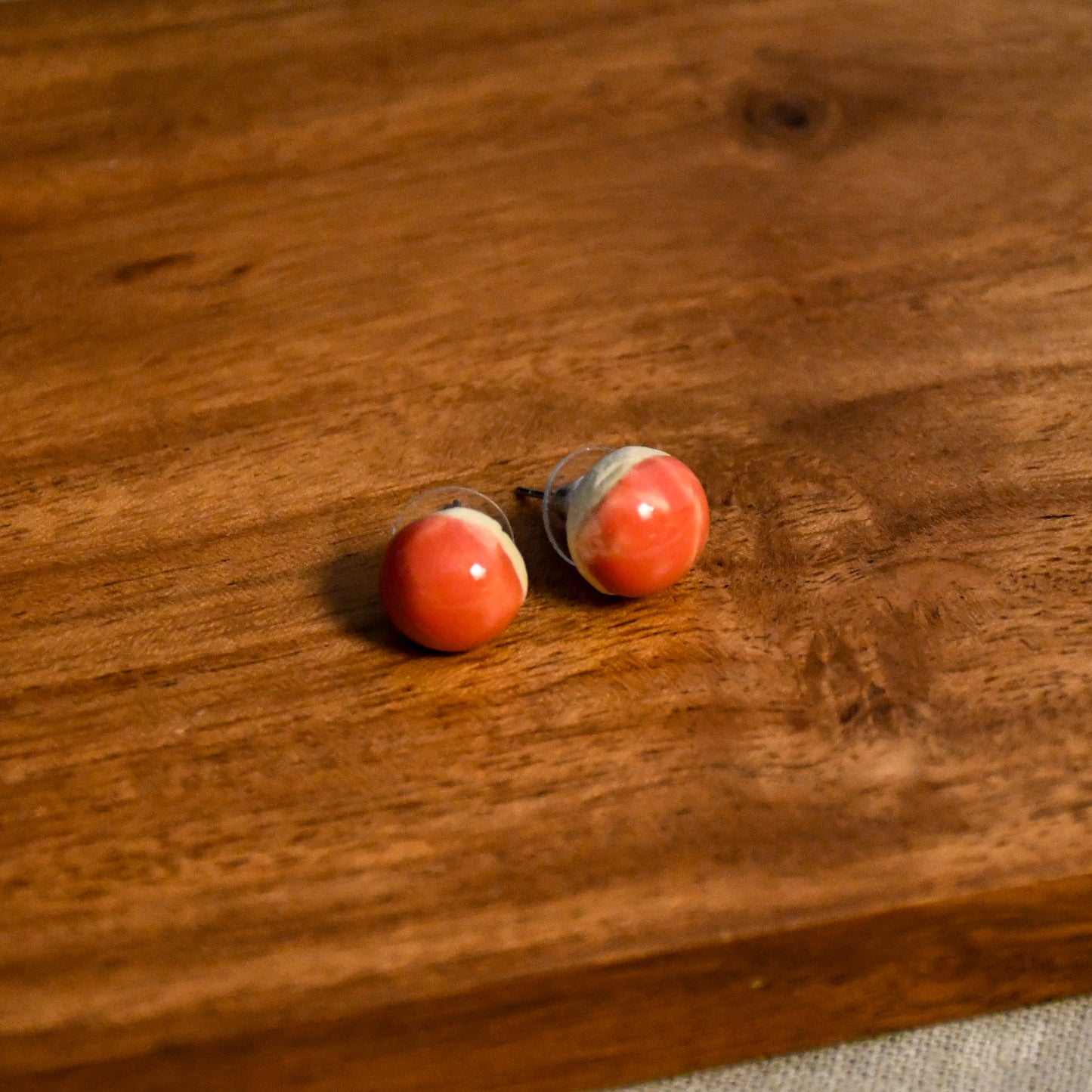 Handmade round ceramic stud earrings by Leigh Art.