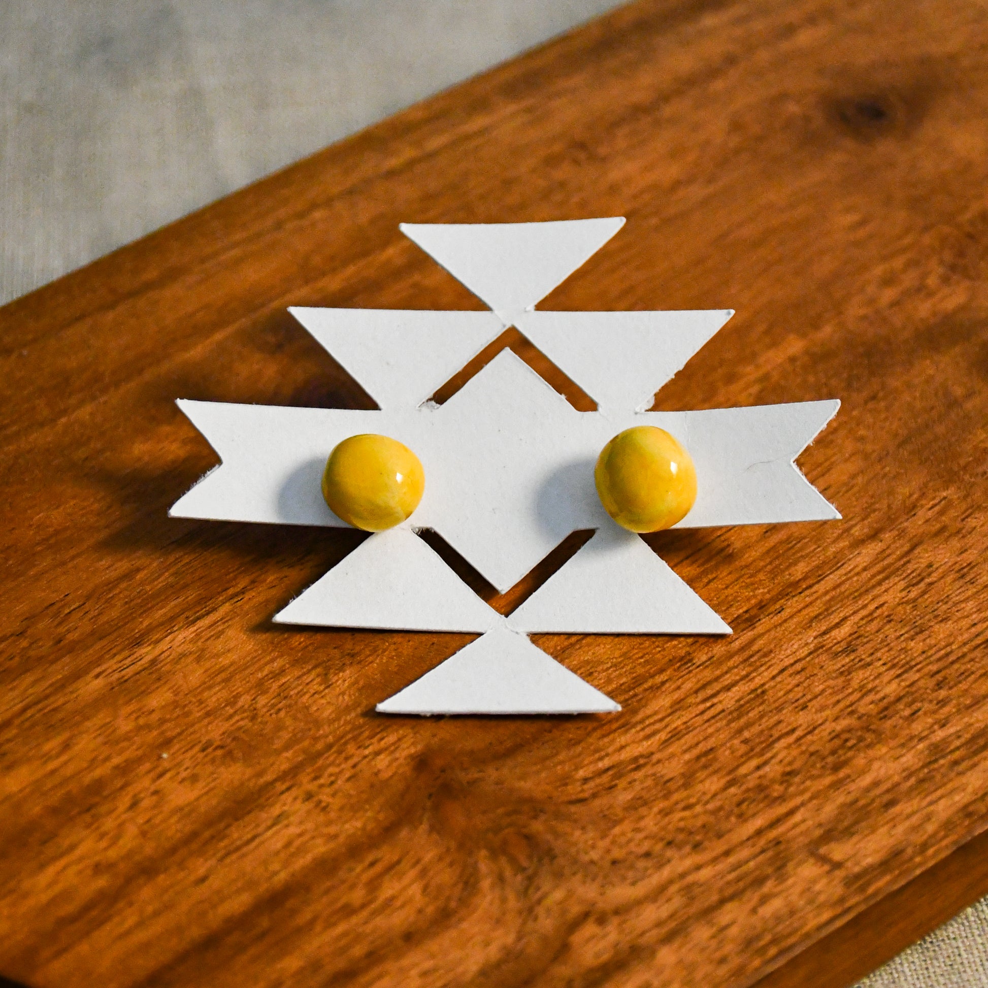 Handmade round ceramic stud earrings by Leigh Art.