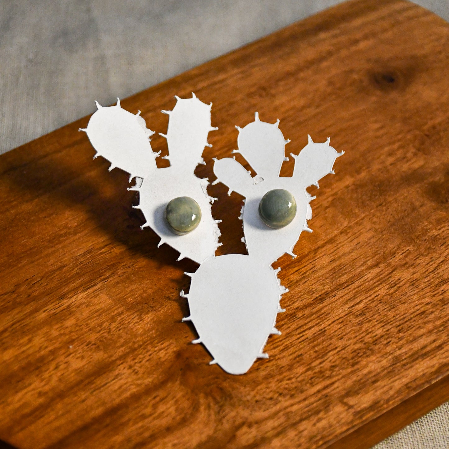 Handmade round ceramic stud earrings by Leigh Art.