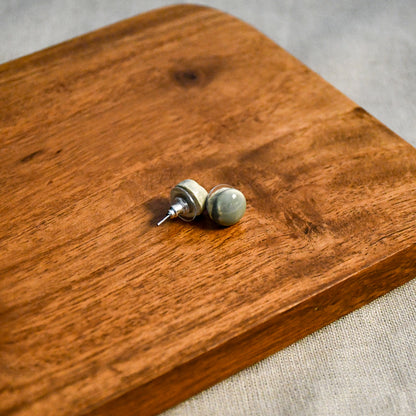 Handmade round ceramic stud earrings by Leigh Art.
