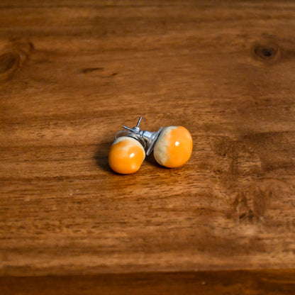 Handmade round ceramic stud earrings by Leigh Art.