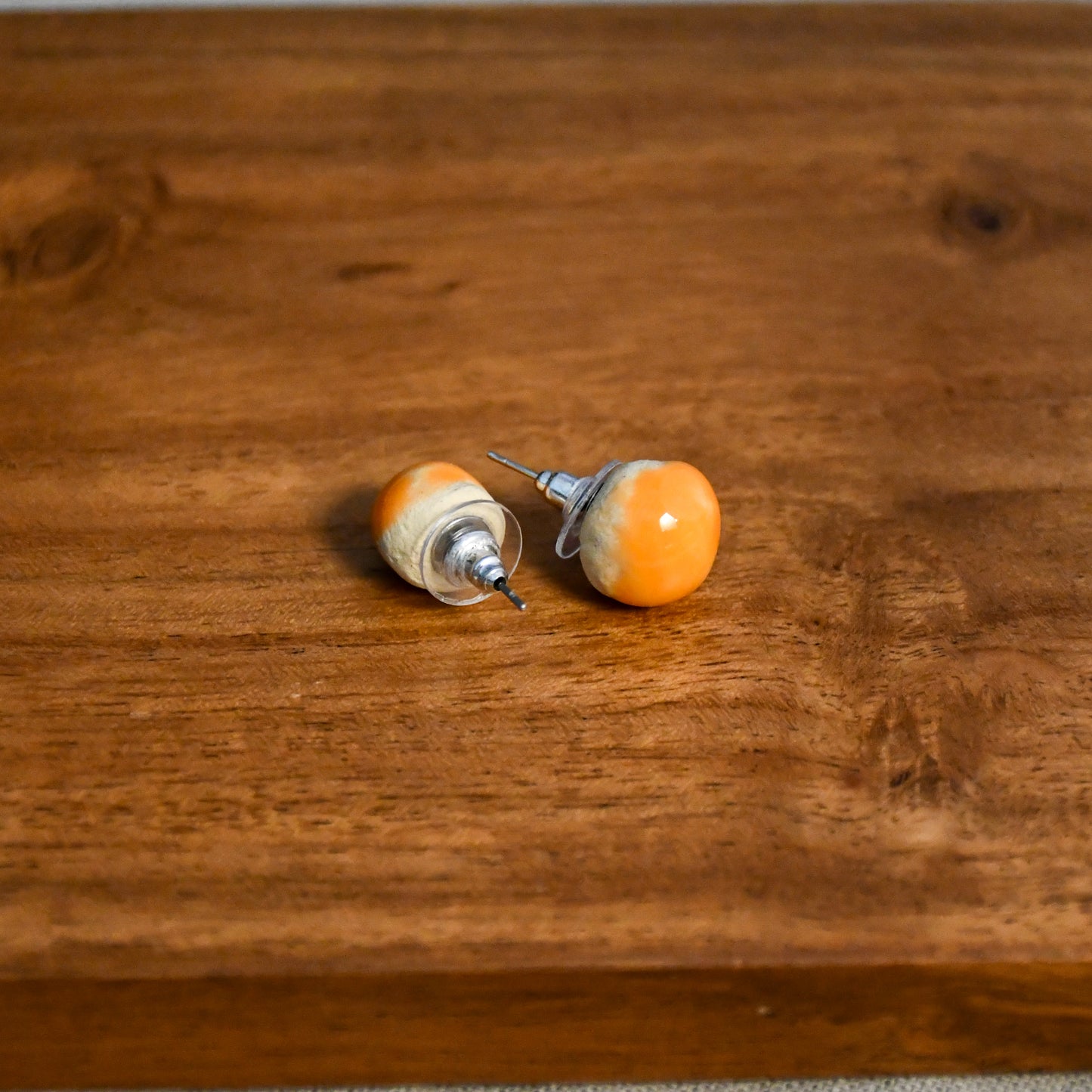 Handmade round ceramic stud earrings by Leigh Art.