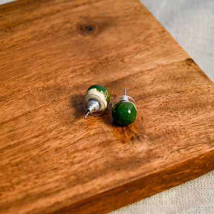 Handmade round ceramic stud earrings by Leigh Art.