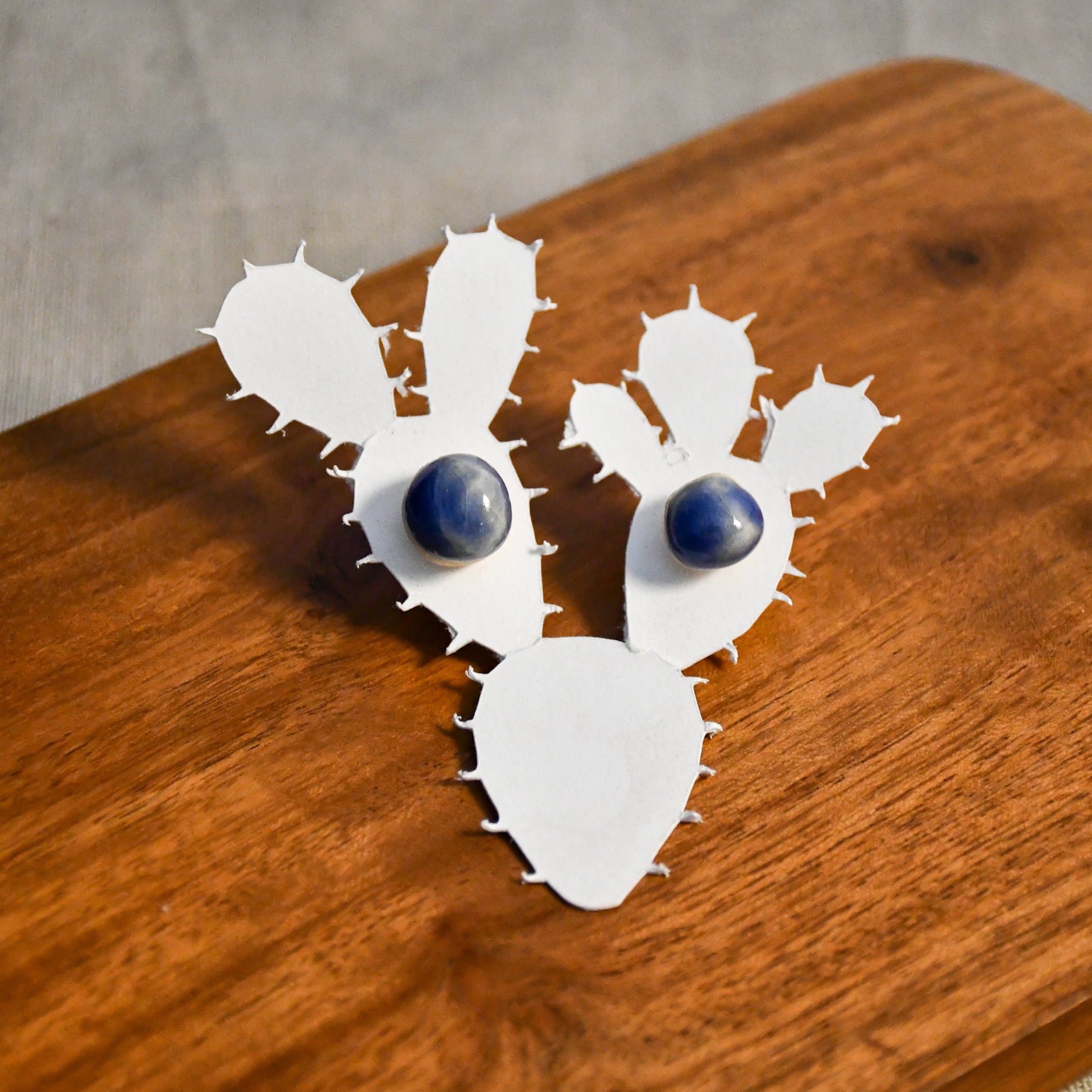 Handmade round ceramic stud earrings by Leigh Art.