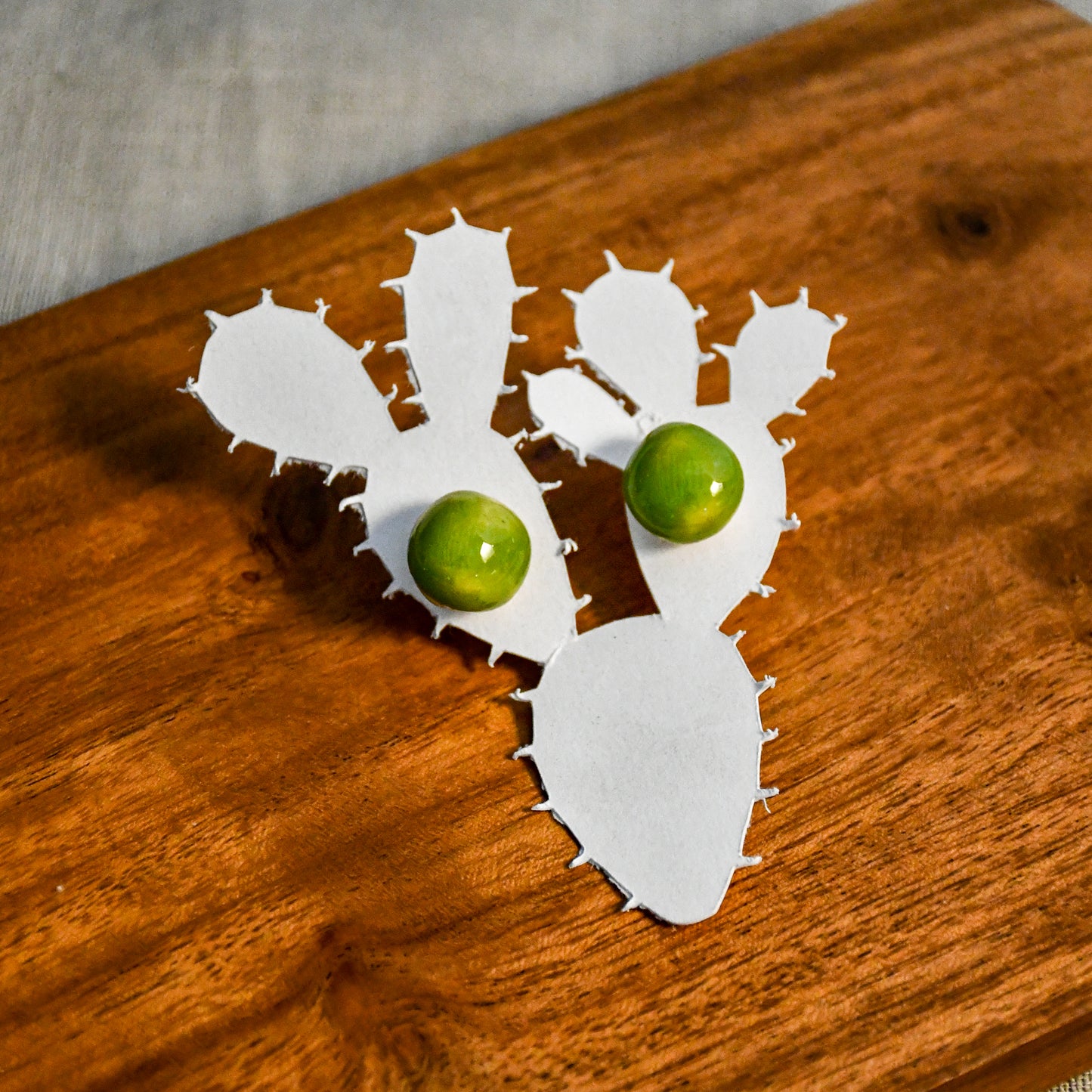 Handmade round ceramic stud earrings by Leigh Art.